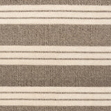 Broadloom carpet in a wide stripe in grey and cream with grey accent stripes. 