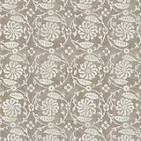 Wallpaper with white floral and leaf design on a dark taupe background