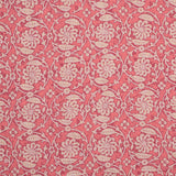 Patterned fabric with floral & vine design on a pink background