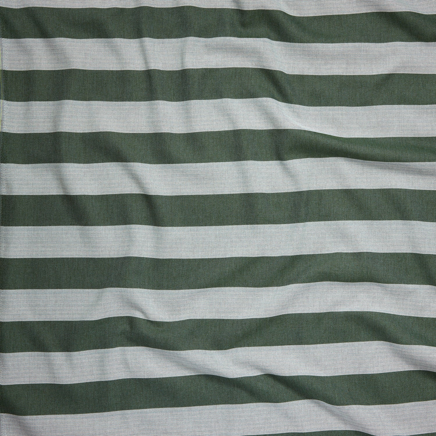 Close up of gently draped woven Indoor-Outdoor fabric with wide stripes in dark green and light blue.