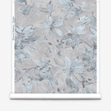 Wallpaper roll with floral pattern on a light gray background