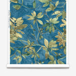 Roll of wallpaper with green leaf pattern on a blue background