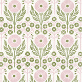 Printed linen in an arts and crafts style floral pattern in pink and green on white. 