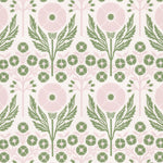 Printed linen in an arts and crafts style floral pattern in pink and green on white. 