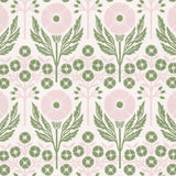 Printed linen in an arts and crafts style floral pattern in pink and green on white. 