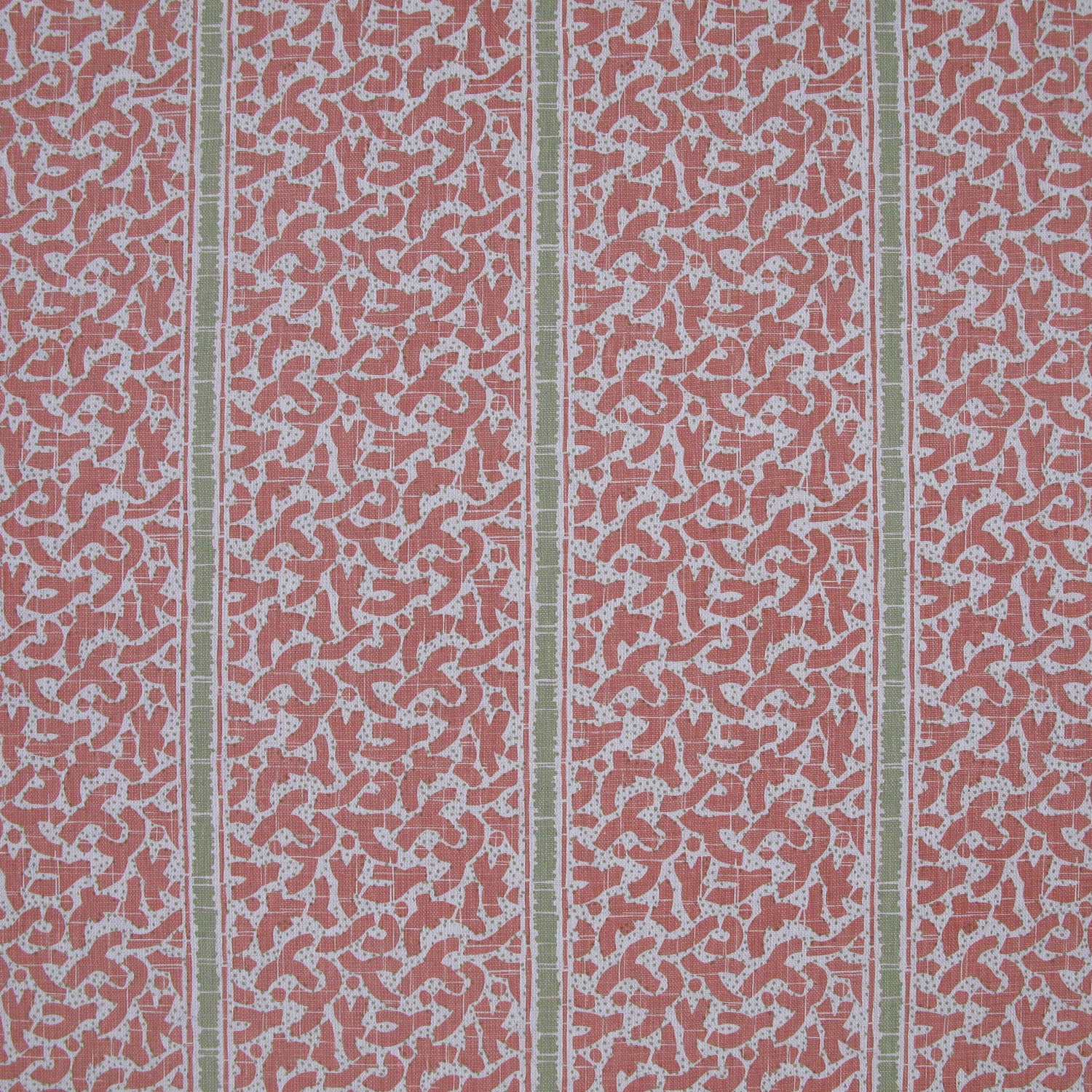 Printed fabric detail in a geometric rhythmic stripe in a warm pink with a light green accent. 