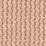 Printed linen in a wavy floral stripe design in red on cream.