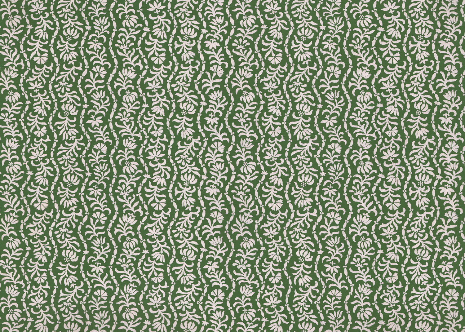 Printed linen in a wavy floral stripe design in green on white. 
