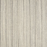 Broadloom carpet in a striated herringbone stripe in cream and grey.