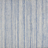 Broadloom carpet in a striated herringbone stripe in cream and bright blue.