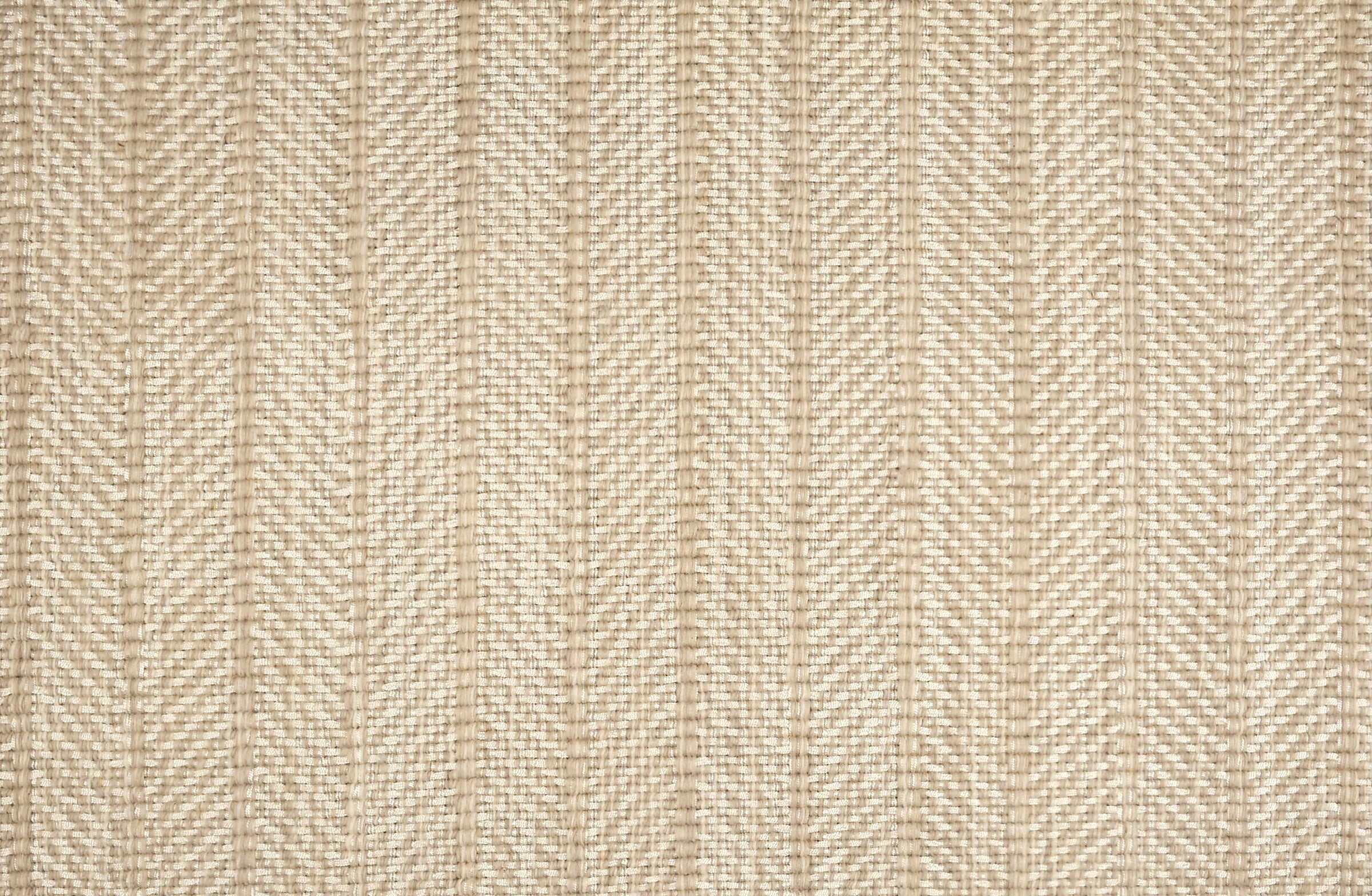 Broadloom carpet in a striated herringbone stripe in cream and beige.