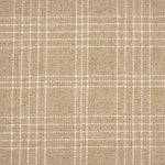 Broadloom carpet with windowpane plaid pattern in white on a field of tan.