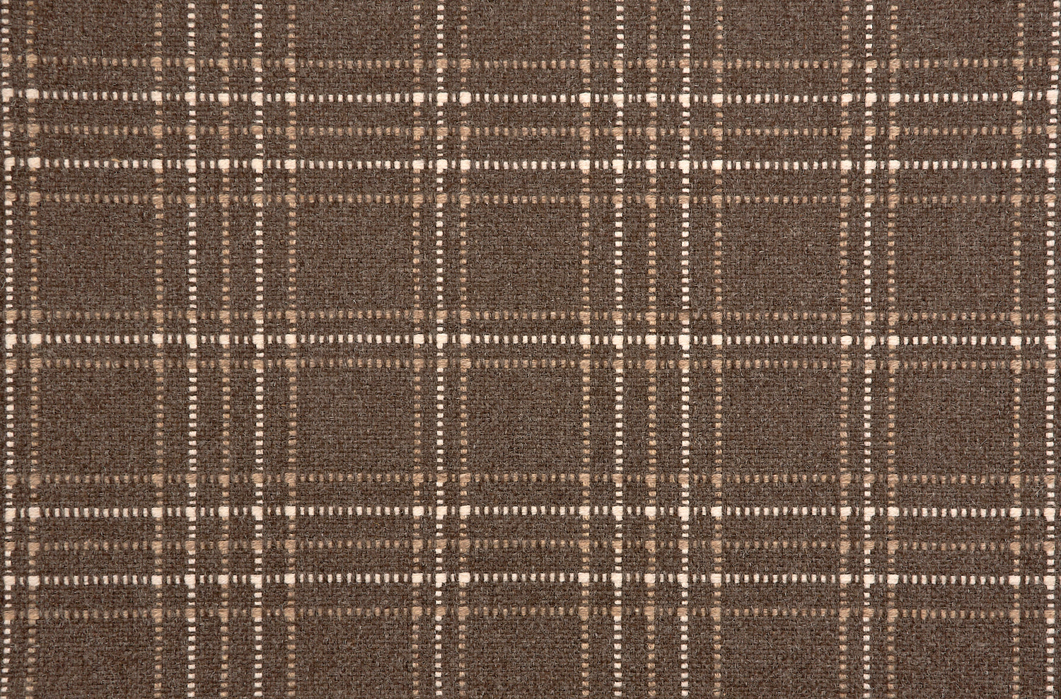 Broadloom carpet with windowpane plaid pattern in white and taupe on a field of chocolate brown.