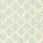 Detail of wallpaper in a repeating damask print in light blue and tan on a cream field.