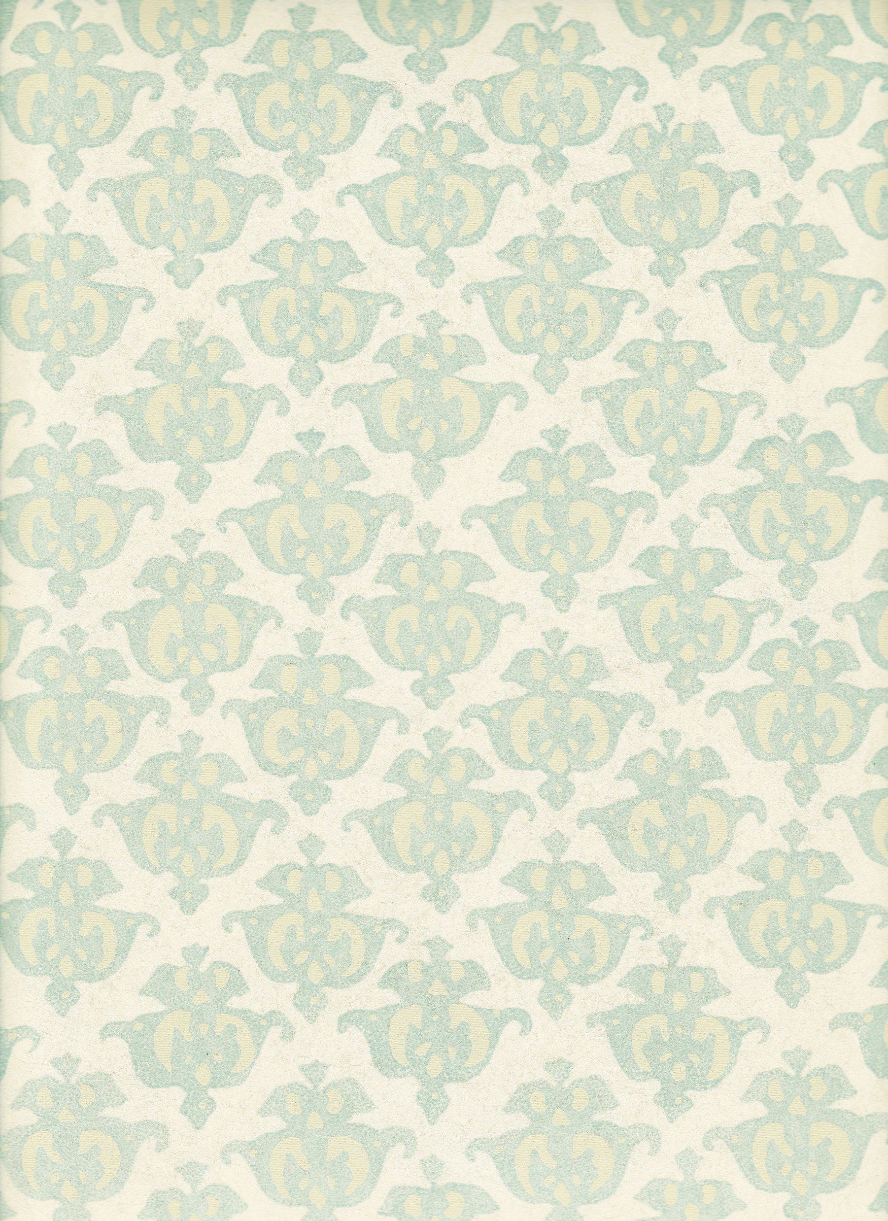 Detail of wallpaper in a repeating damask print in light blue and tan on a cream field.