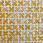 Pattern of yellow cross marks on a white background