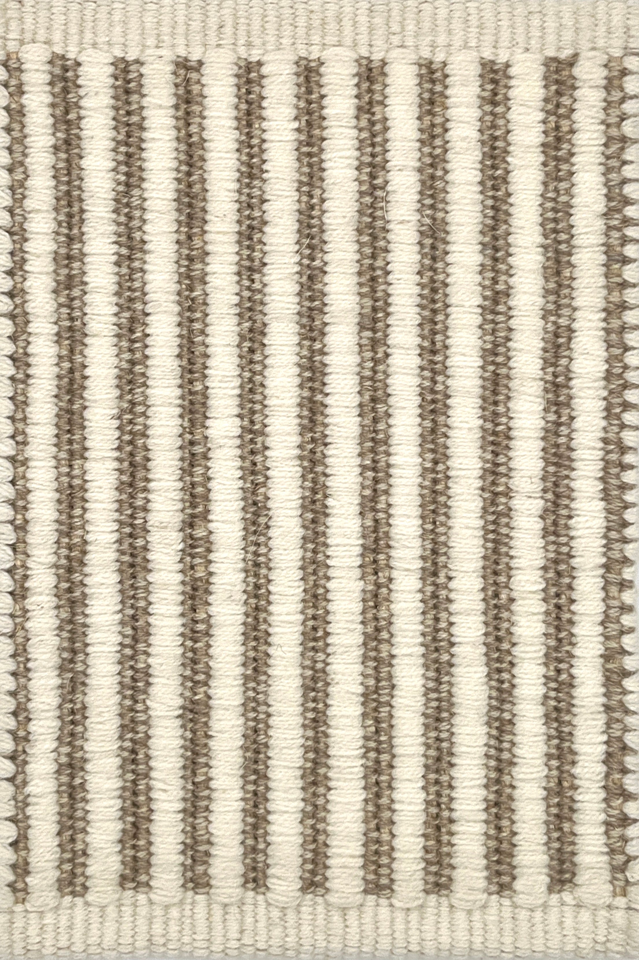 Textured area rug with vertical striped pattern on a neutral background