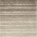 Textured rug with ombré stripes in beige and brown tones