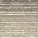 Textured rug with ombré stripes in beige and grey tones