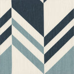 Detail of fabric in an irregular chevron stripe in navy and blue on a white field.