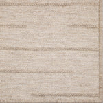 Beige woven texture rug with a subtle pattern