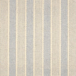 Broadloom carpet in cream and blue stripes.
