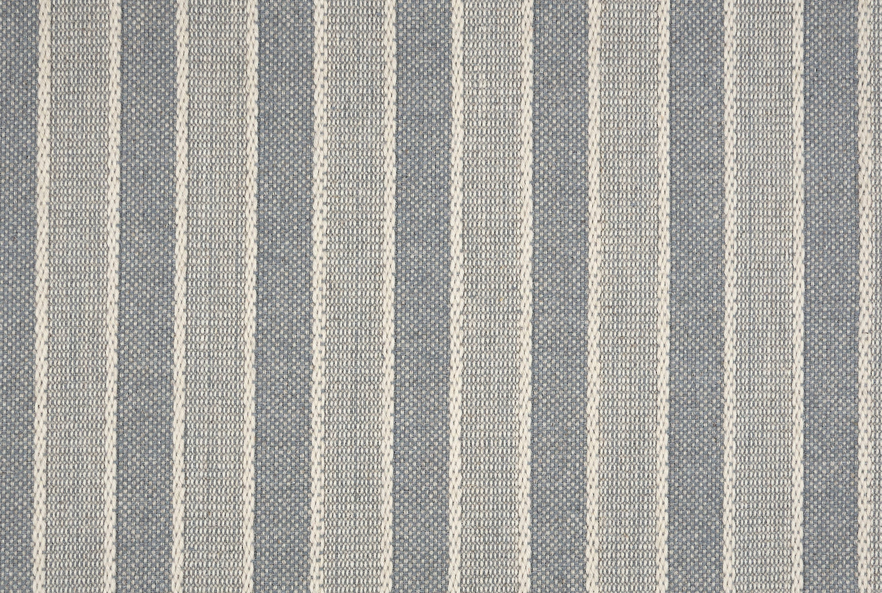 Broadloom carpet in cream and steel blue.
