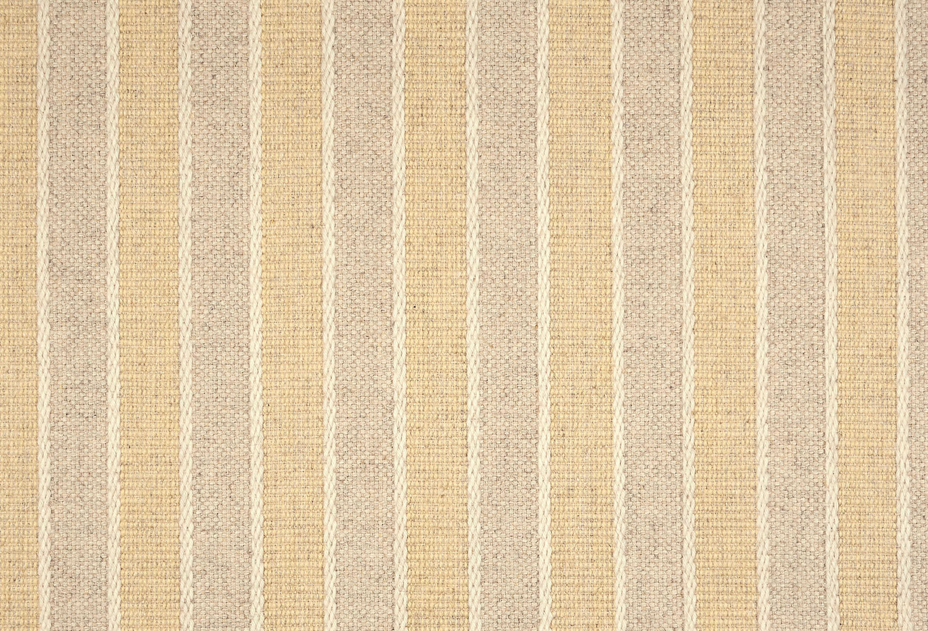 Broadloom carpet in cream and yellow stripes.