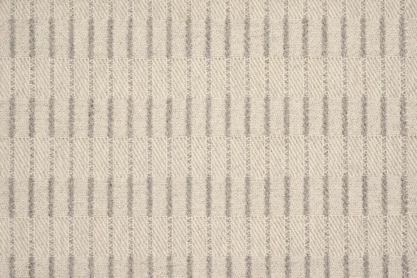 Broadloom carpet sample with a textural stripe in grey on ivory