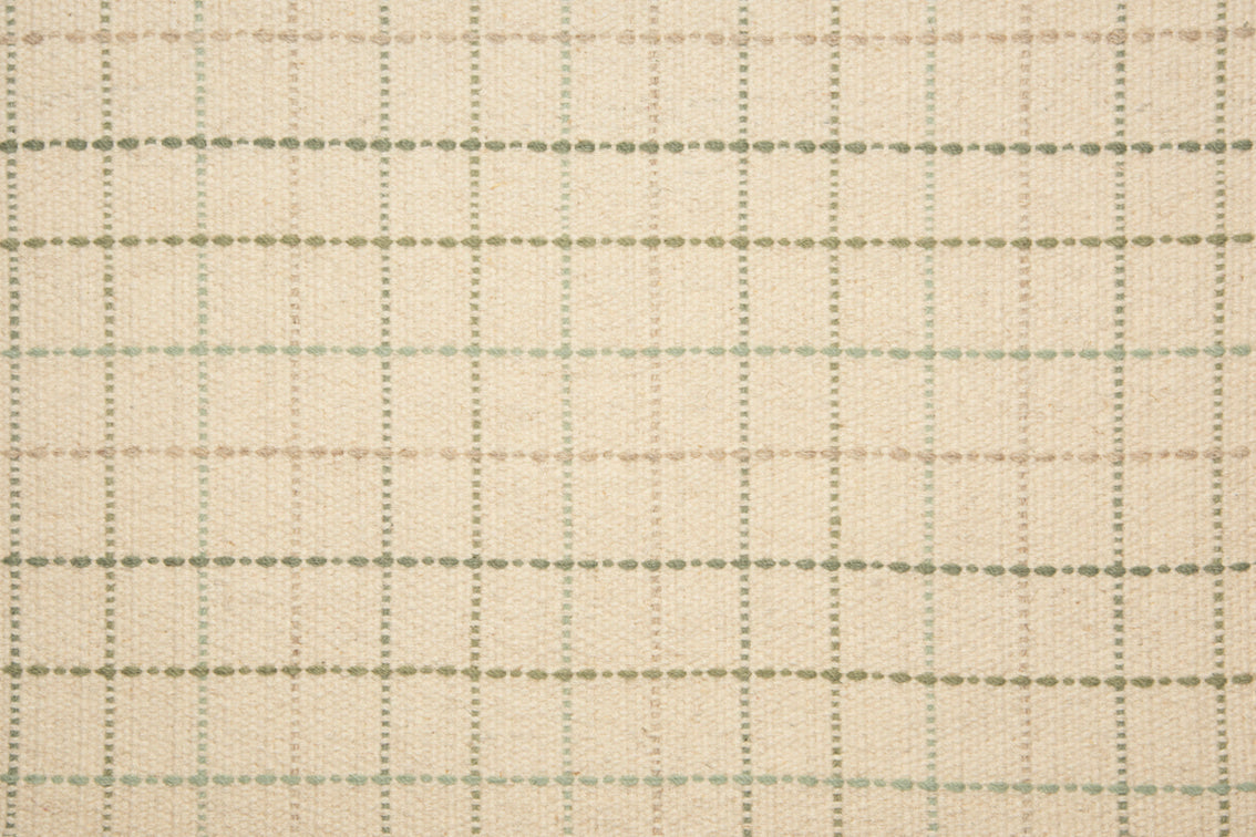 Broadloom carpet with a window pane plaid pattern in shades of green on a cream field. 