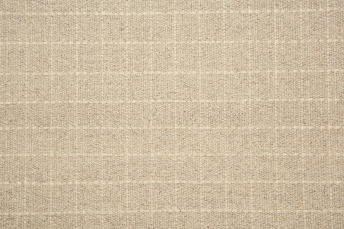 Broadloom carpet with window pane plaid in shades of cream on a light grey field.