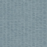 Detail of wallpaper in a small-scale checked pattern in shades of blue.