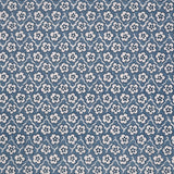 Fabric with small scale floral pattern in white, navy and blue.