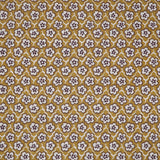 Fabric with small scale floral pattern in white, brown and yellow. 