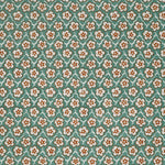 Fabric with small scale floral pattern in white, orange and turquoise. 