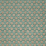 Fabric with small scale floral pattern in white, orange and turquoise. 