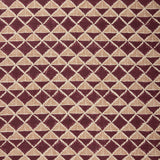 Fabric with a geometric pattern of triangles in wine purple and brown.