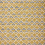 Fabric with a tan and navy blue geometric pattern.