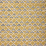 Fabric with a tan and navy blue geometric pattern.