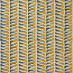 Close-up of fabric with a geometric leaf pattern in blue and ochre.