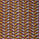 Patterned fabric with geometric design in purple, yellow, and blue.