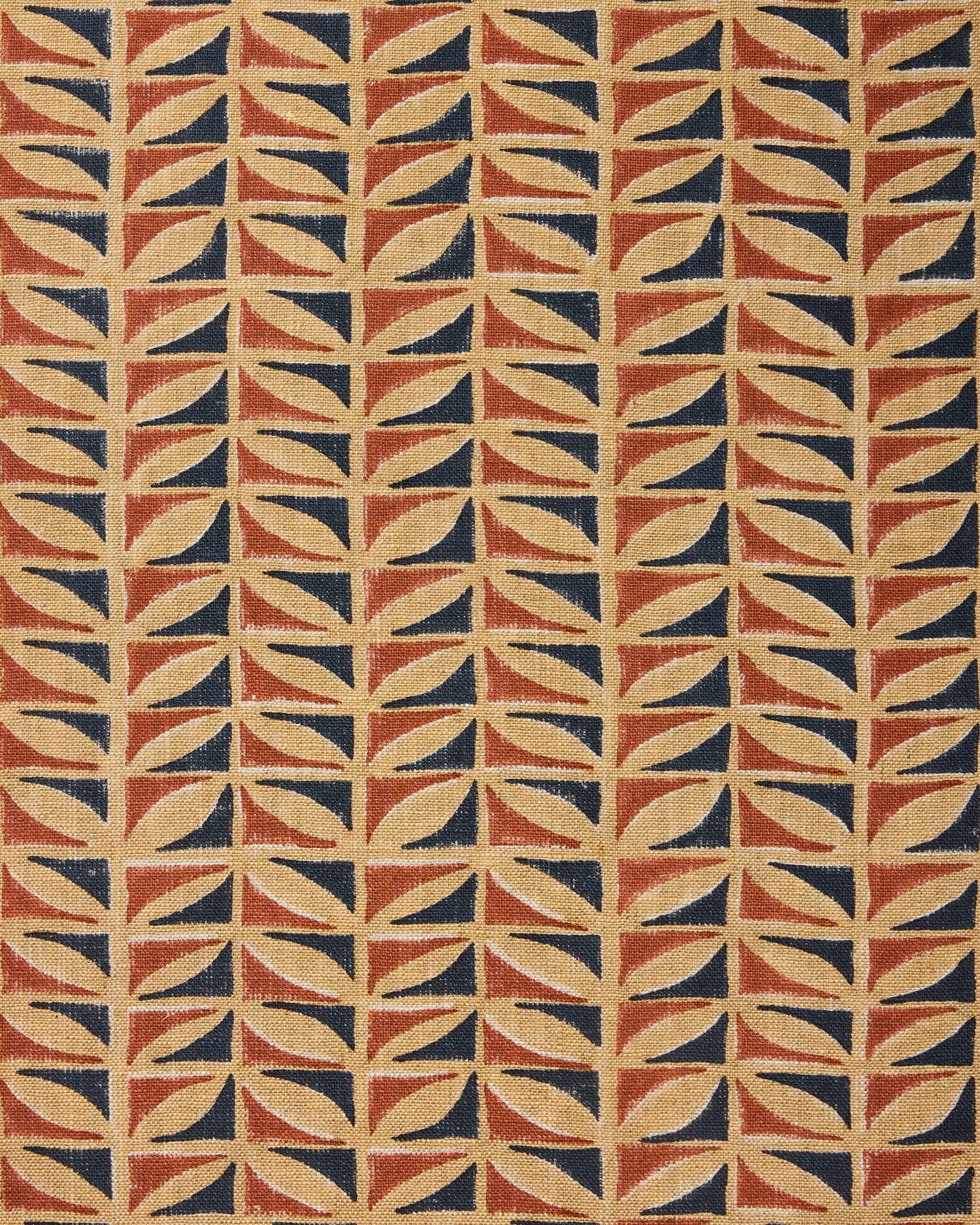 Patterned fabric with geometric design in red, blue, and beige.