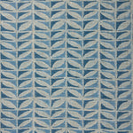 Close-up of fabric with a leaf pattern in shades of blue.