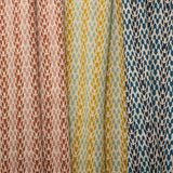 Three fabric swatches abstract leaf patterns in various colors.