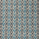 Close up of fabric with abstract leaf pattern in shades of blue. 