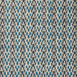 Close up of fabric with abstract leaf pattern in shades of blue. 