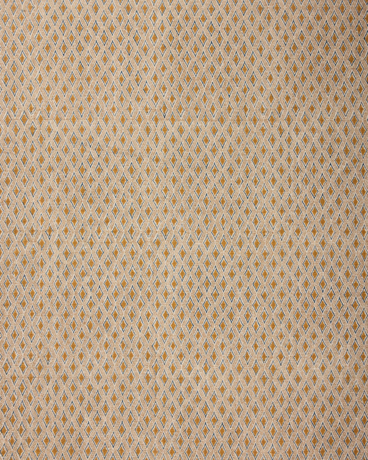 Textured fabric with a diamond pattern in beige and brown tones