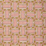 Fabric with geometric mosaic pattern of pink and green.