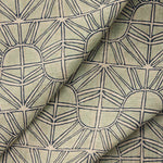 Draped fabric with geometric sun pattern  in light blue with navy blue outline