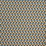 Woven fabric swatch in a repeating mosaic print in shades of blue, rust and gray on a cream field.